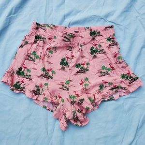 Flare pinkish/peachy colored shorts